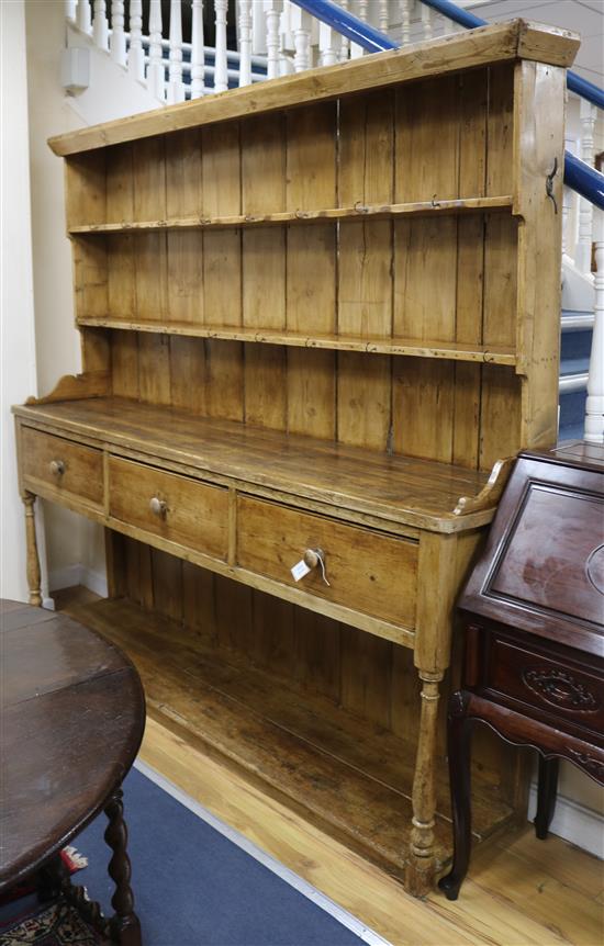 A 19th century Irish pine dresser W.214cm